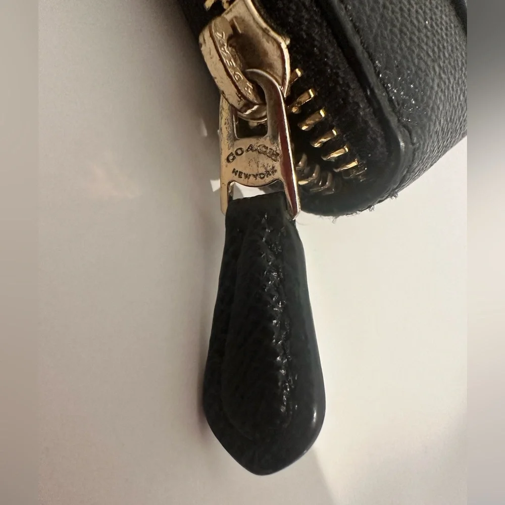Coach accordion zip